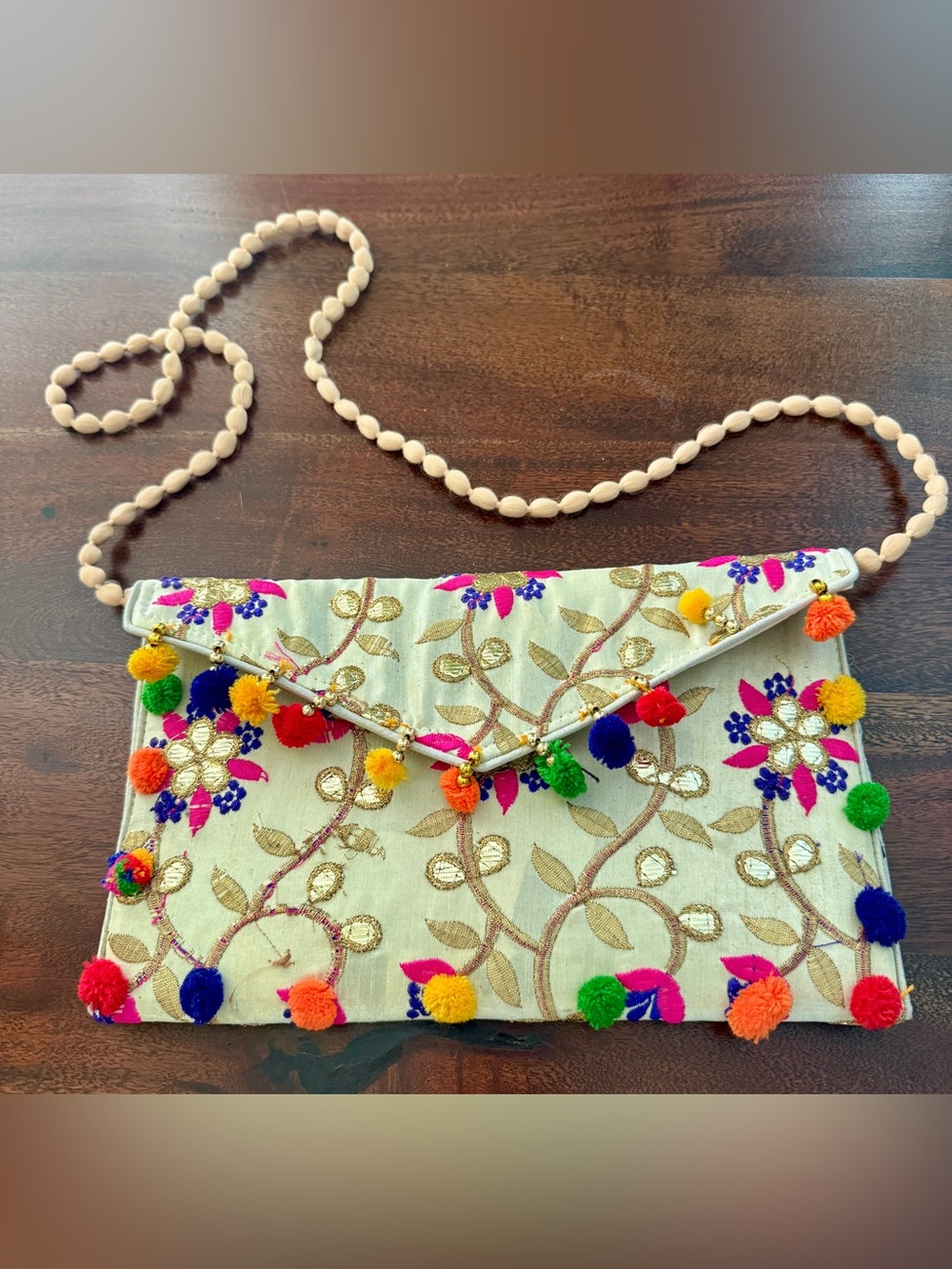 Anthropologie Embroidered Cream Clutch with Multicolor Pom Poms